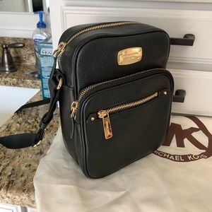Michael Kors crossbody bag .